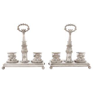 PAIR OF CRUET-STANDS. FRANCE, 19TH CENTURY. Sterling silver, sealed with a profile of Michelangelo. Comes with silversmith ETIENNE-AUGUSTE COURTOIS’s 