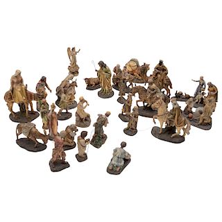 NATIVITY SCENE. MEXICO, 20TH CENTURY. Golden ceramic figures in polychrome including serigraphed details and decorated miniatures.