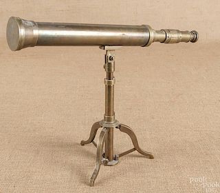 Brass telescope, late 19th c., mounted to a tripo