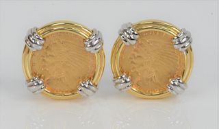 Pair of Coin Mounted Earrings, with $2.5 gold quarter eagles, 1913 and 1925, in 18 karat setting of white and yellow gold. 28 grams.