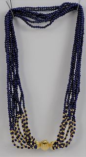Lapis and Gold Bead Necklace, ten strands, 18 karat gold scalloped clasp in a Grant A. Peacock case, 450 Park Ave N.Y. length 17 1/2 inches, 2.8 milli