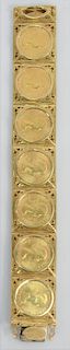 18 Karat Gold Bracelet, mounted with seven gold sovereigns 1964. length 7 1/4 inches, 104.8 grams.