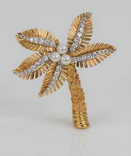 18 Karat Gold Palm Tree Brooch, set with three pearls and thirty eight brilliant cut diamonds, approximately 1.5 carats total weight. height 2 1/4 inc