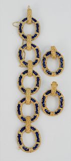 Three Piece Set, to include 18 karat gold and blue enameled bracelet, and pair of earrings having rough finish centered with blue enameling. 103 grams