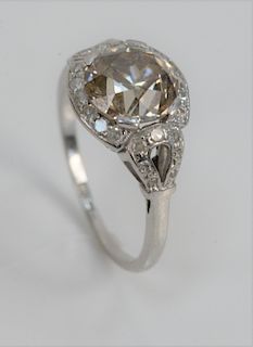 Platinum Ring Set with Center Champagne Diamond, approximately 2.5 carats, surrounded by small diamonds, size 8 1/2.