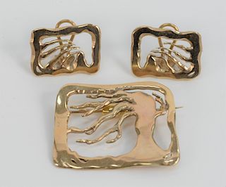 Three Piece Lot, to include 14 karat brooch and pair of clip on earrings having tree motif. 19.9 grams.