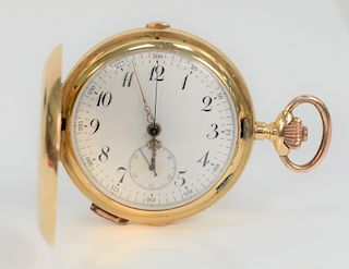 18 Karat Gold Closed Face Pocket Watch, having stopwatch and repeater (small dents). 57 millimeters, total weight 118 grams.