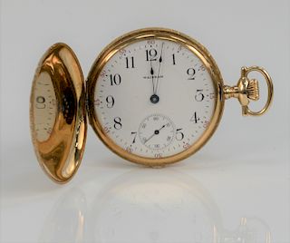Waltham 14 Karat Gold Closed Face Pocket Watch, with fleur de lis on either side. 47. 6 millimeters, total weight 87 grams.