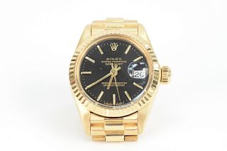Rolex 18 Karat Gold Ladies Wristwatch, oyster perpetual datejust with original box, T68 6917. total weight 66.1 grams.