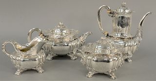 Four Piece Tiffany Chrysanthemum Sterling Tea and Coffee Set, to include tea pot, coffee pot, creamer, and sugar all in Chrysanthemum pattern. height 