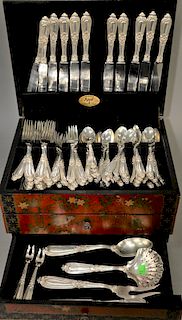 Buccellati Silver Flatware Sterling Set, seventy seven total pieces to include each shaped terminal molded case with central petarae, twelve dinner fo