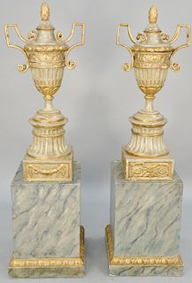 Pair of Monumental Continental Faux Marble Urns, classic form having pineapple finial with metal mounted handles on square bases on faux marble painte
