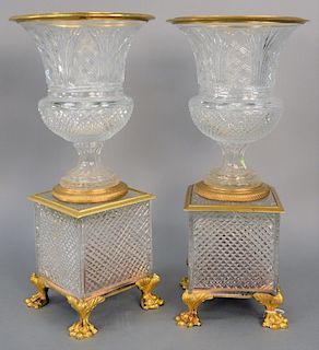 Pair of Large Cut Crystal and Bronze Dore Urns, each having cylindrical form with cut trellis pattern, bronze fitted rim, and gilt bronze handles all 