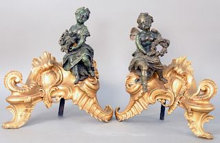Pair of Louis XV Style Bronze Dore Figural Cabinets, 19th century or later, having a boy putti figure holding a wreath and the other with a girl holdi