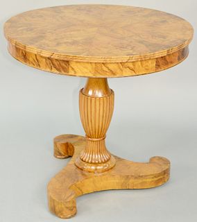 Biedermeier South German Burl Walnut Veneered Center Table, set on reeded standard on scrolling tripod foot. height 26 3/4 inches, diameter 29 inches.