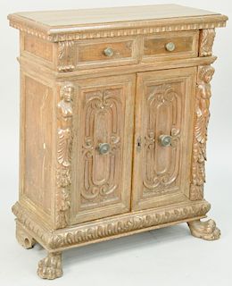 Continental Baroque Carved Walnut Small Cabinet, two short drawers over two carved doors with paw feet, restored or made up of old elements. height 35