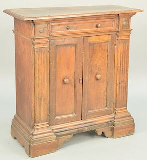 Continental Provincial Small Cabinet, one drawer over two doors oak secondary (cupping to top, splits and separations throughout with some losses). he
