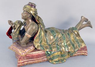 Austrian Style Polychrome Mechanical Erotic Woman, four parts, woman lounging across pillows with removable wrap, cloak, and hat. height 16 1/2 inches