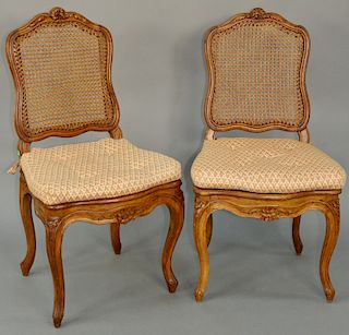 Group of Nine Louis XV Side Chairs, carved beechwood with caned back and seat raised on cabriole legs. height 38 inches, seat height 16 inches. Proven