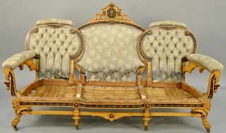 Renaissance Revival Victorian Sofa, maple with various wood inlays having carved paw feet in old finish attributed to Herter Brothers. height 44 inche