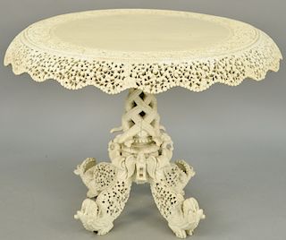 Anglo Indian Center Table, with carved and pierce carved top on serpent and dragon carved pedestal, painted white, 19th century. height 31 1/2 inches,