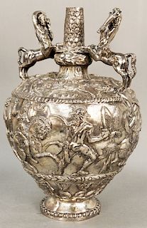 Large Silver Plated Urn, having pair centaur figural handles, bulbous form with embossed green battle scene. height 16 1/2 inches, diameter 11 inches.