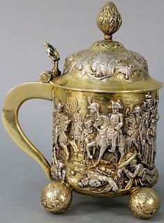 Covered Silver Tankard, having pine cone finial having embossed cover depicting battle scene with Napoleon, all set on ball feet marked on bottom Gruf