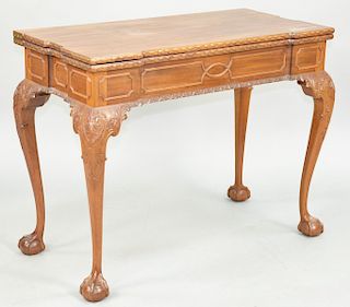 Margolis Custom Mahogany Chippendale Style Games Table, having shaped top with carved edge over paneled frieze set on carved cabriole legs ending in p