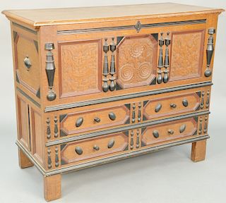 Margolis Oak Sunflower Chest, having lift top, three carved panels over two drawers. height 40 1/2 inches, top: 21 1/2" x 49".