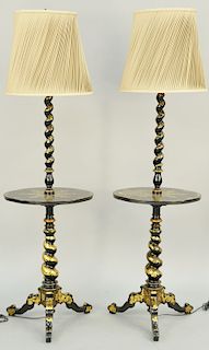 A Pair of Victorian Black and Gilt Japanned and Mother of Pearl Inset Lamp Tables, 19th century, spiral twist support and oval top decorated with arab