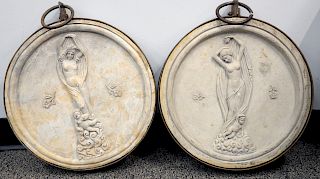 Pair of Italian Round Marble Plaques, having relief carved nouveau, nude figures in an iron roundel, 20th century. diameter 16 inches.