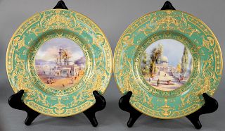 Set of Twelve Royal Worcester Service Plates, each with fitted orientalist mid eastern hand painted scenes, high relief gold borders, artist signed W.