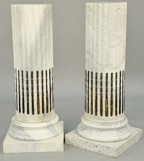 Pair of White Marble Pedestal, column style with brass stop fluting, set on round and square bases (small chips at top). height 39 inches, diameter 10