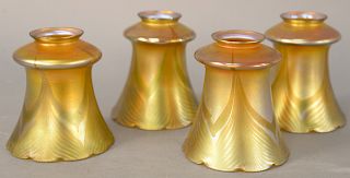 Set of Four Quezal Gold Iridescent Shades, pulled feather design, all signed Quezal. height 5 1/8 inches, diameter 4 5/8 inches.
