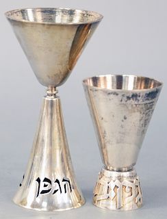 Two Ludwig Wolpert Judaica Sterling Silver Kiddush Cups, small cup with applied letters on foot along with a goblet with tapered stem pierced letters,