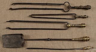 Three brass and iron fire tongs, together with a