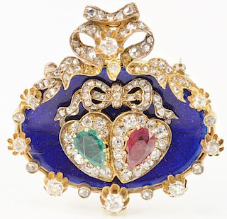 14 Karat Oval Sweetheart Brooch, brooch has a royal blue enamel base set with one pear shape emerald and one pear shape ruby in the center, ruby is su