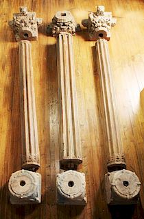 Three Carved Wood and Cast-Stone Columns