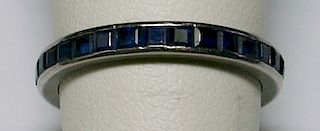 18K and Blue Sapphire Eternity Band