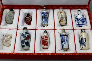 A group of 10 snuff bottles in a box