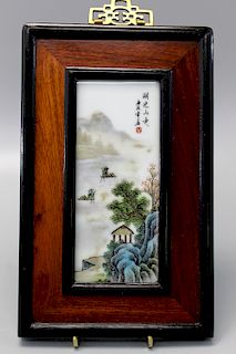 Chinese famille rose procelain plaque with wood frame.