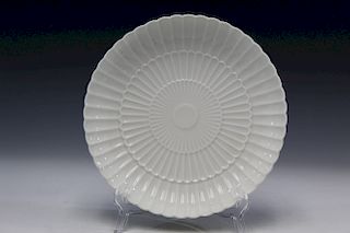 White glazed porcelain plate, marked Royal Copenhagen.