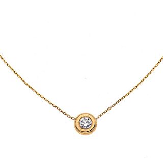 Collar y pendiente con diamante en oro amarillo de 14k. 1 diamante corte brillante 0.30ct. Peso 2.4 g.