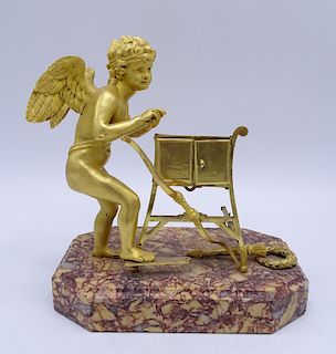 EARLY DORE BRONZE CUPID ON ROUGE MARBLE BASE