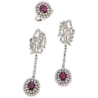 RING AND EARRINGS SET WITH RUBIES AND DIAMONDS. PALADIUM SILVER
