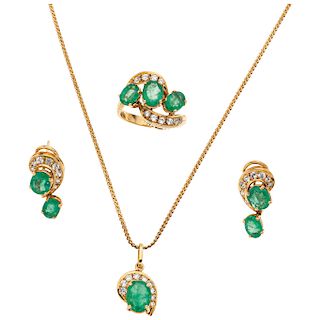 PENDANT, RING AND EARRINGS SET WITH EMERALDS AND SIMULANTS. 14K YELLOW GOLD
