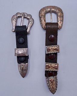 2 STERLING SILVER AND LEATHER BUCKLES