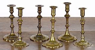 Three pairs of Queen Anne brass candlesticks