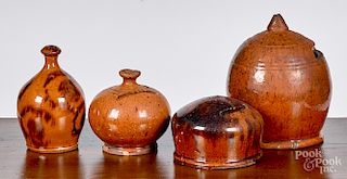 Four redware penny banks