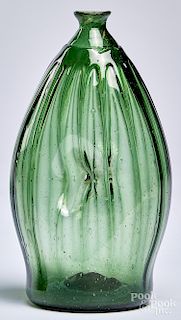 Emerald green glass pinch bottle